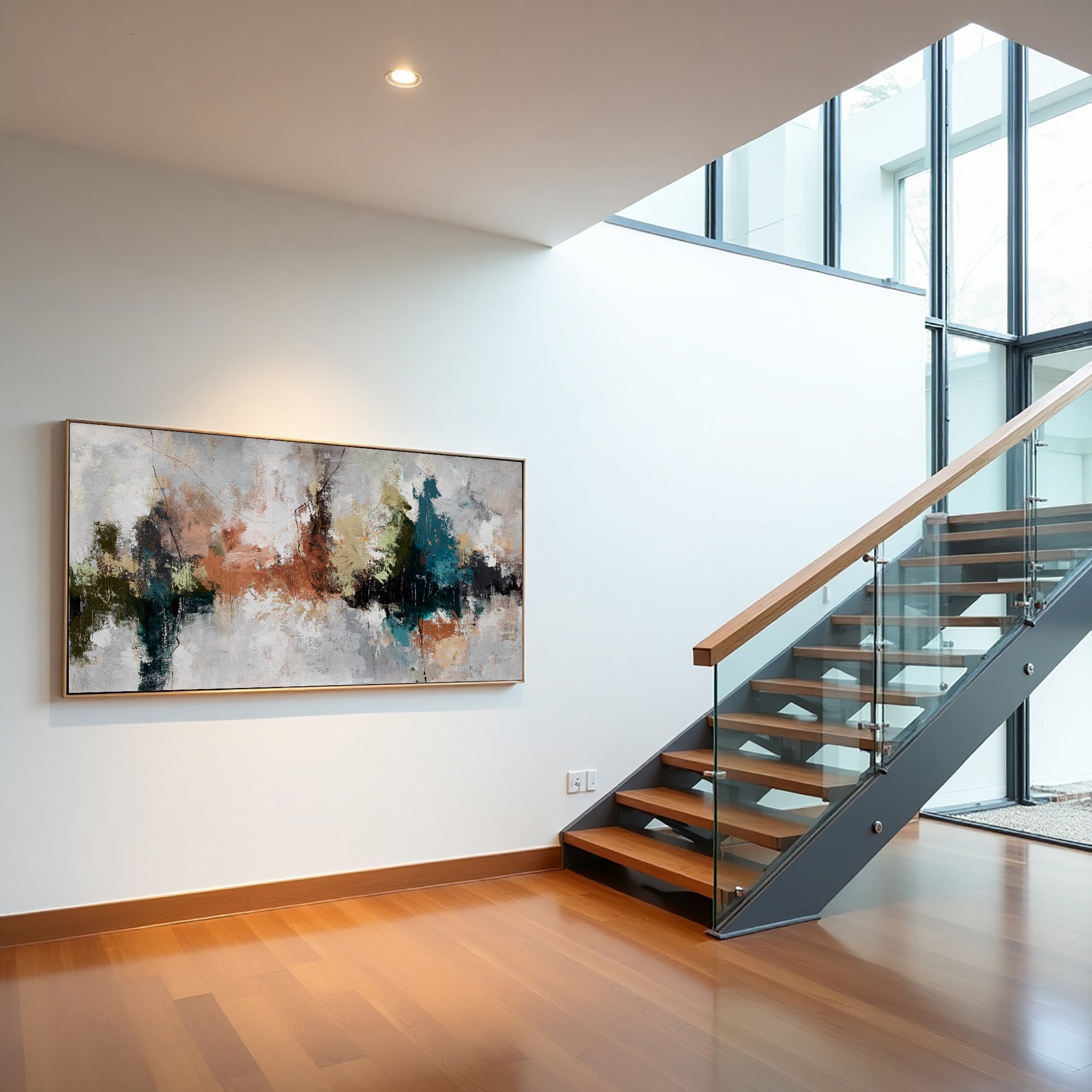 Quiet Divide teal-accented abstract painting displayed beside a modern glass-and-wood staircase