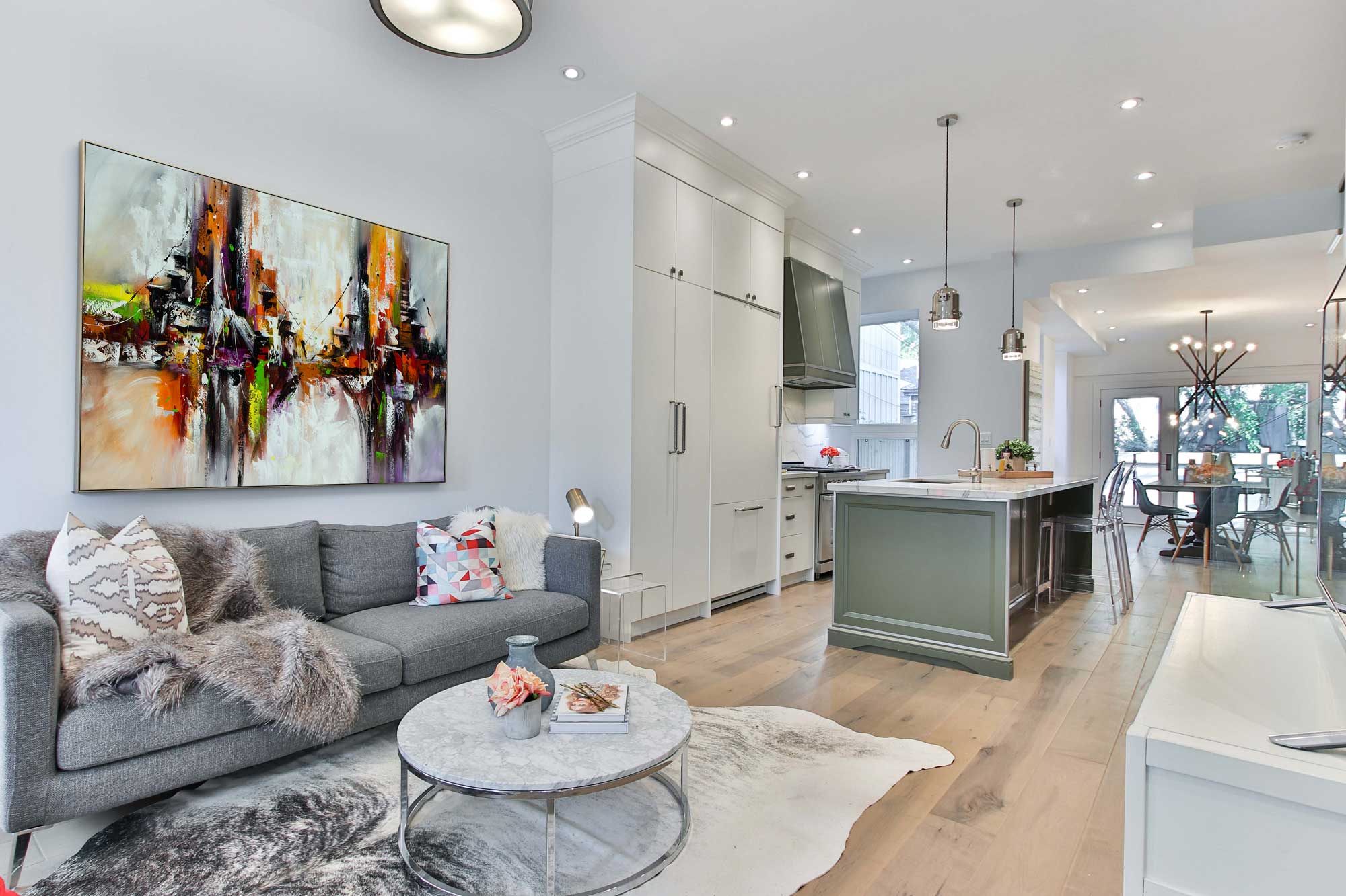 Dancing Duo - Abstract art category - open plan living room side display - golden silver frame style