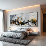 Golden Faultline wide abstract painting above a bed in a contemporary bedroom