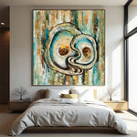Abstract painting of a yin and yang symbol on a wall above a bed in a modern bedroom.